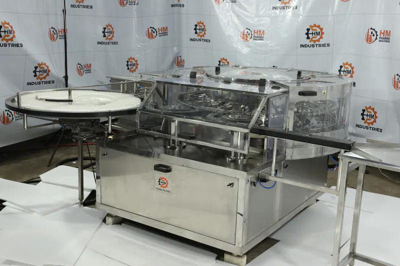 Automatic rotary gripper pharmaceutical bottle washing machine manufactured in India by H M Pharma Machines